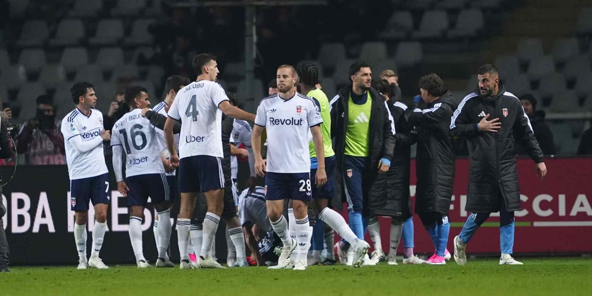 Como players celebrate after scoring against Torino