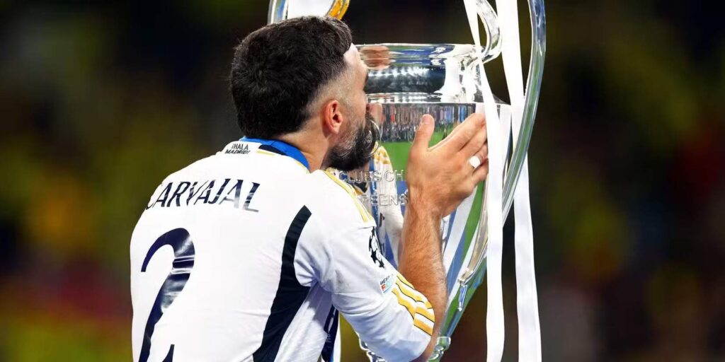 Daniel Carvajal kissing the Champions League trophy