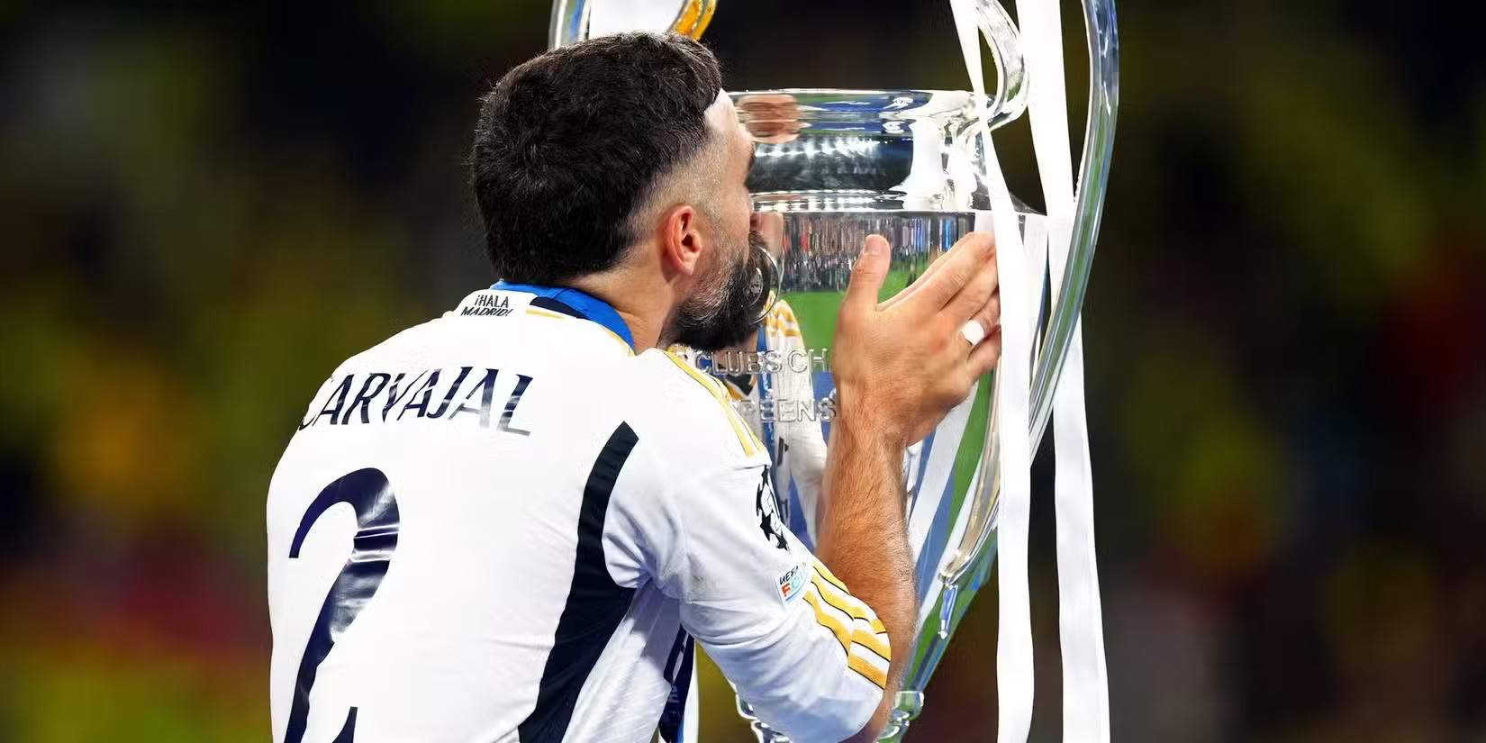 Daniel Carvajal kissing the Champions League trophy