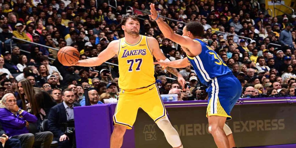 Steph Curry guarding Luka Doncic
