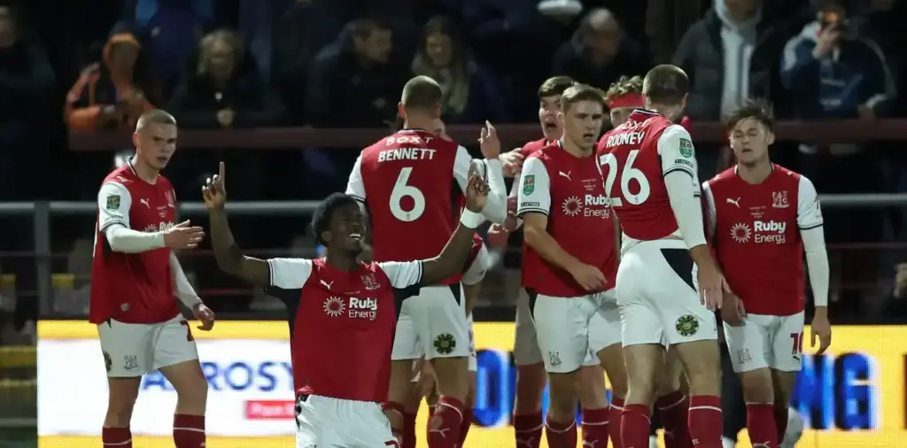 Fleetwood Town players celebrate after scoring against Arsenal