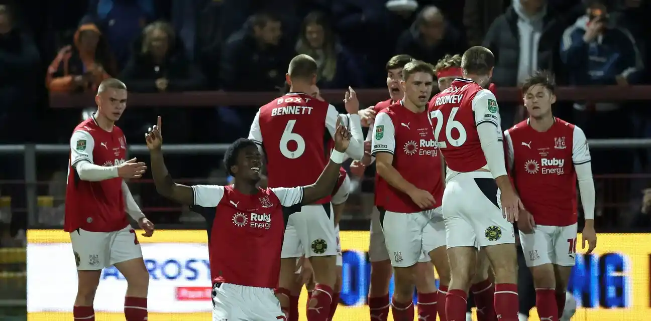 Fleetwood Town players celebrate after scoring against Arsenal