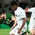 Irish and Austrian players in a battle for the ball