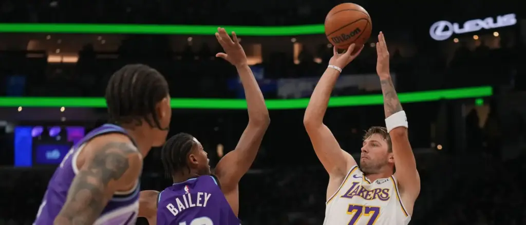 Luka Doncic shooting over Ace Bailey