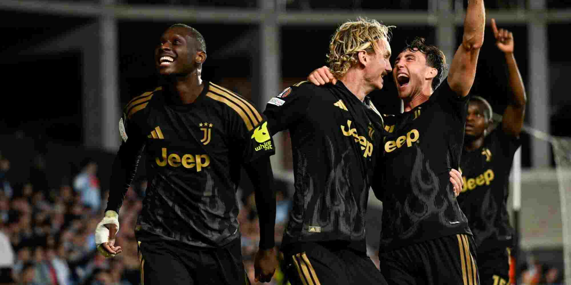 Juventus players celebrate Randal Kolu Muani's late goal against Celta