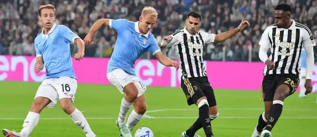 Juventus and Lazio players in a battle for the ball