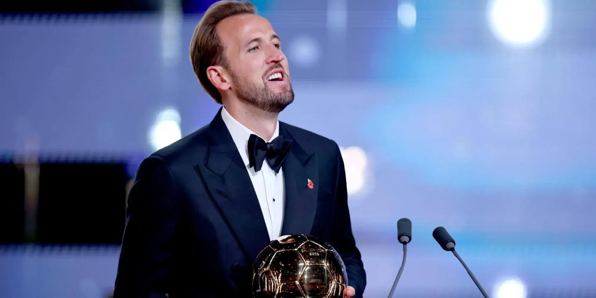 Harry Kane holding the Ballon d'Or trophy