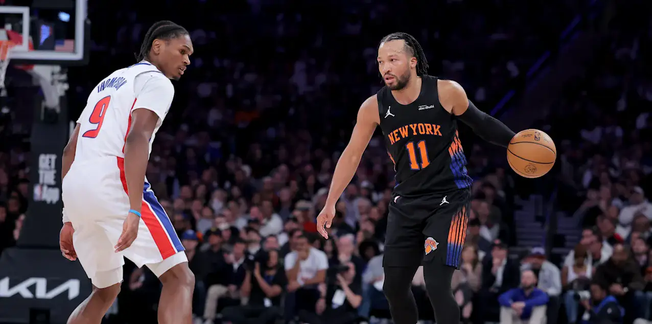 Ausar Thompson watches as Jalen Brunson dribbles the ball