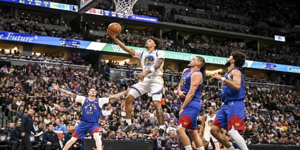 Yaxel Linderborg attacking Denver Nuggets' basket