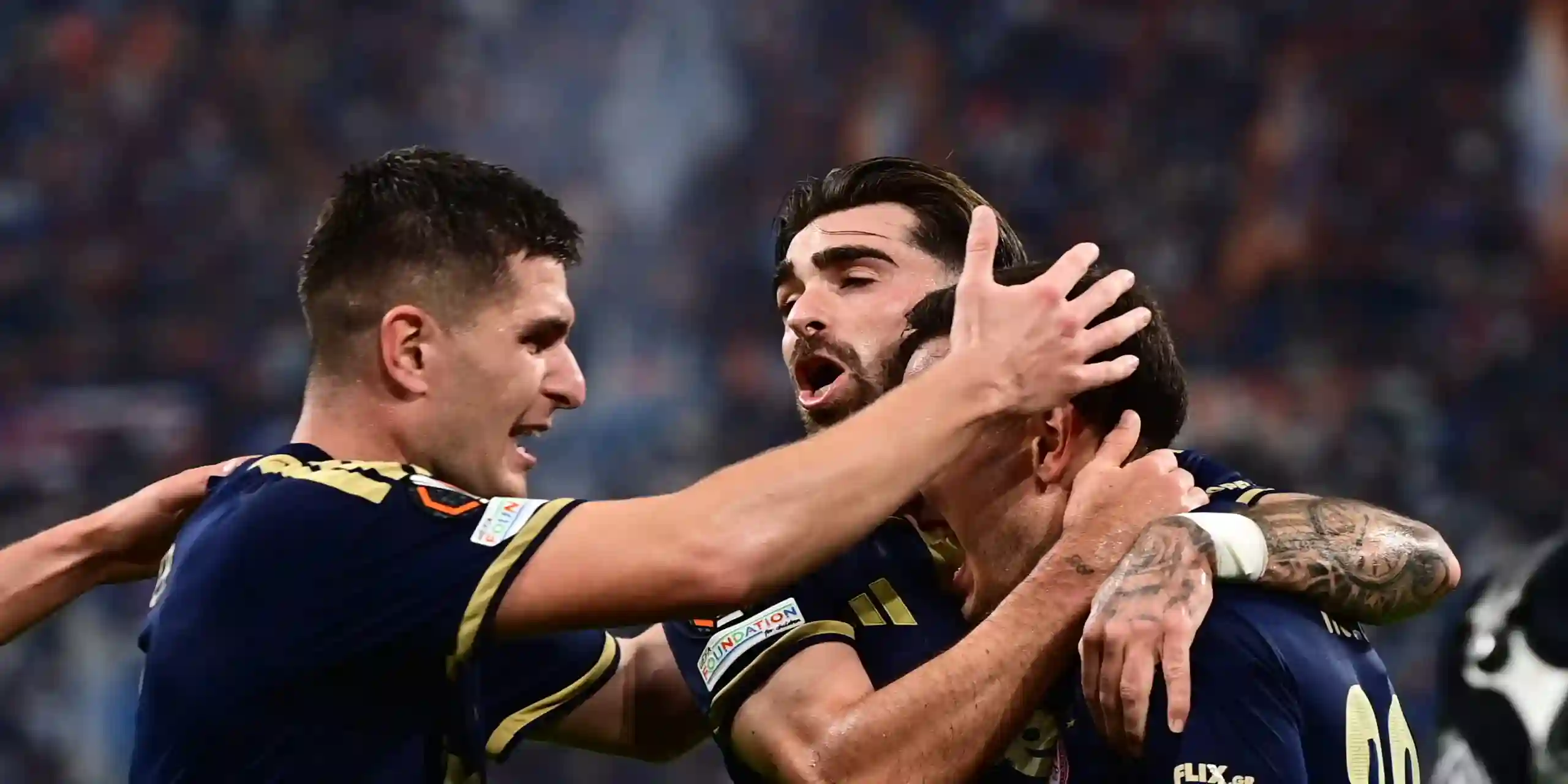 Olympiacos players celebrate after scoring against Marseille
