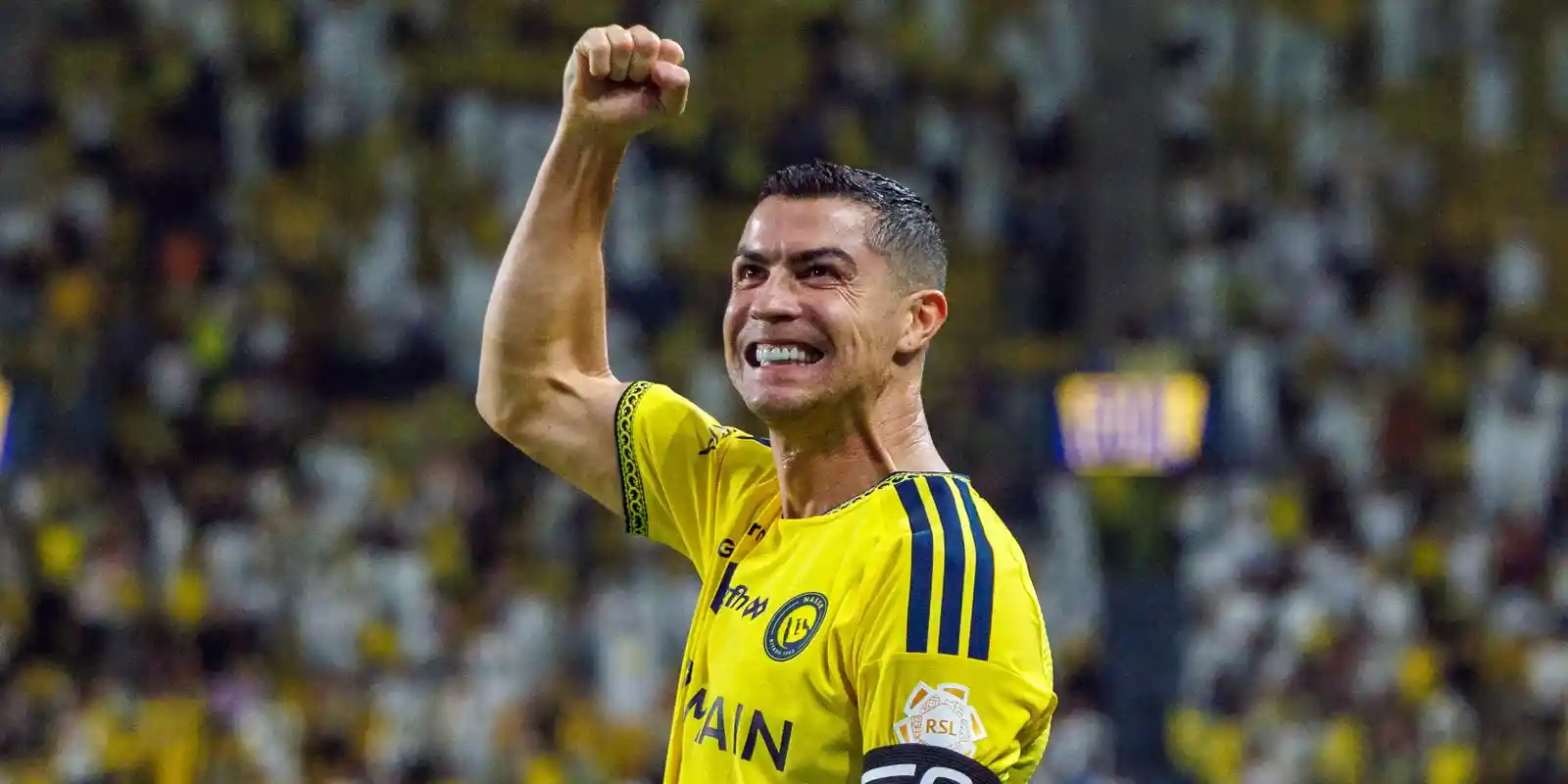 Cristiano Ronaldo punches the air after scoring a hat-trick for Al-Nassr