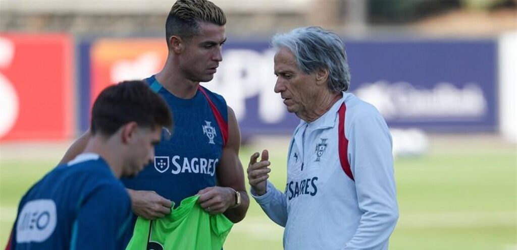 Cristiano Ronaldo and Jorge Jesus talk during Portugal training session