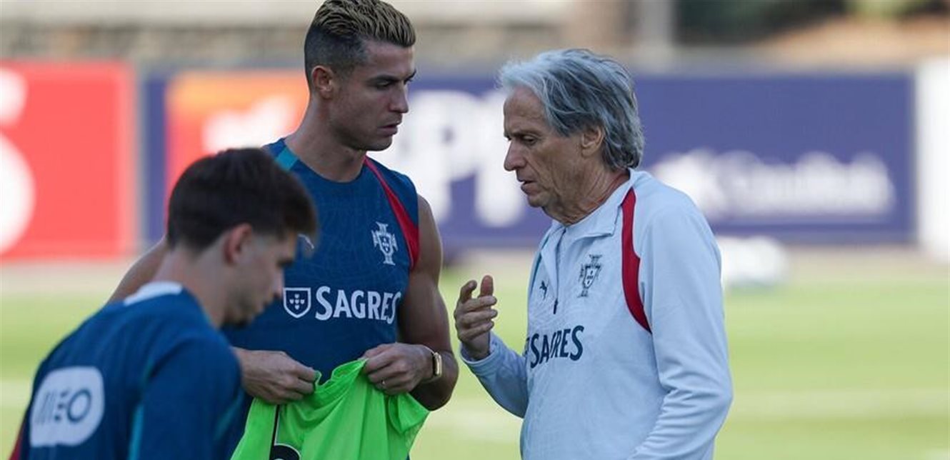 Cristiano Ronaldo and Jorge Jesus talk during Portugal training session
