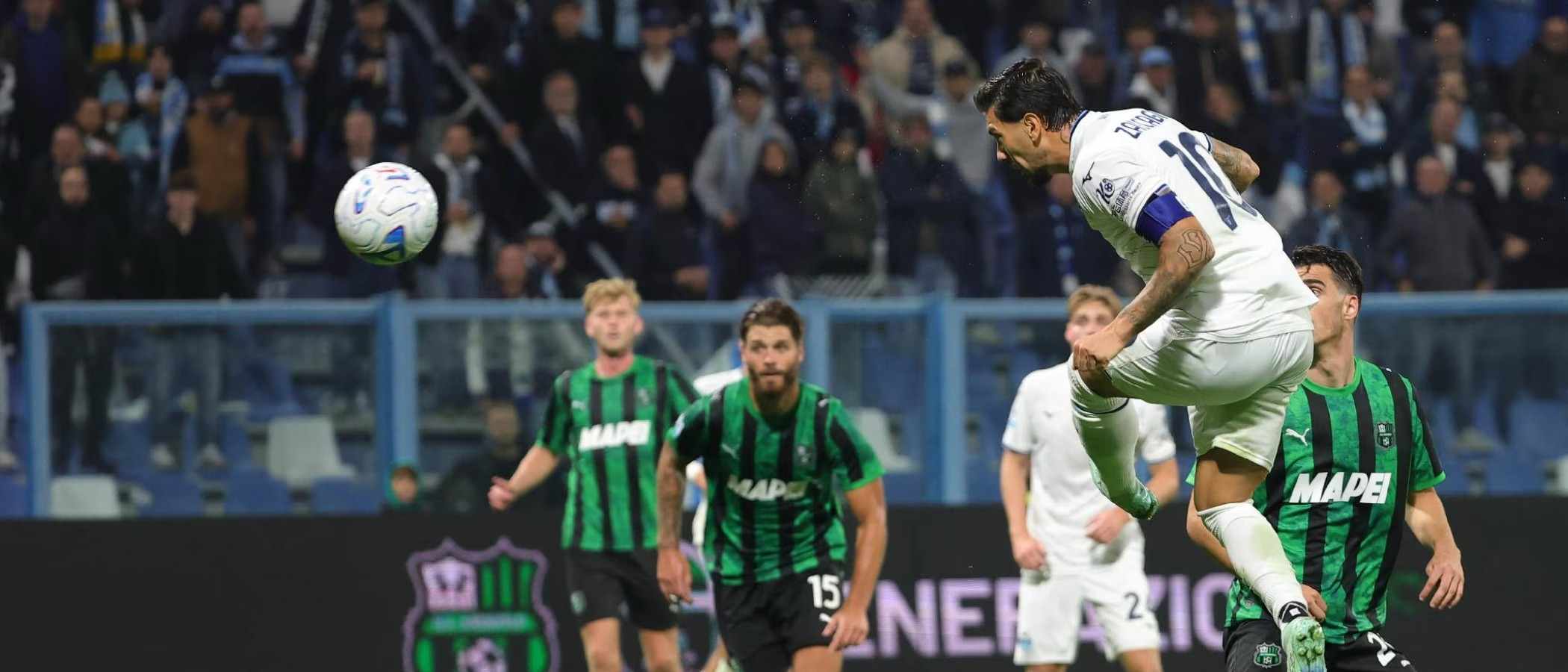 Lazio's Mattia Zaccagni scoring a header against Sassuolo