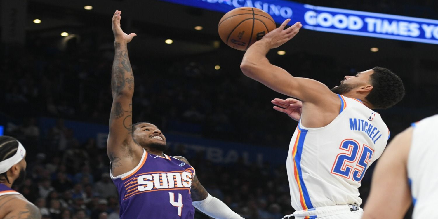 Ajay Mitchell shooting at Phoenix Suns' basket