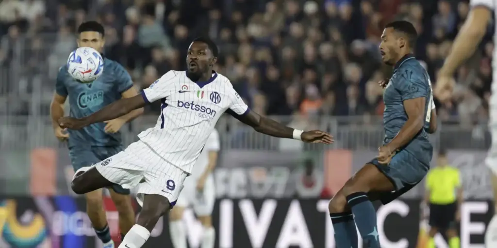 Marcus Thuram ready to volley the ball in the match against Venezia