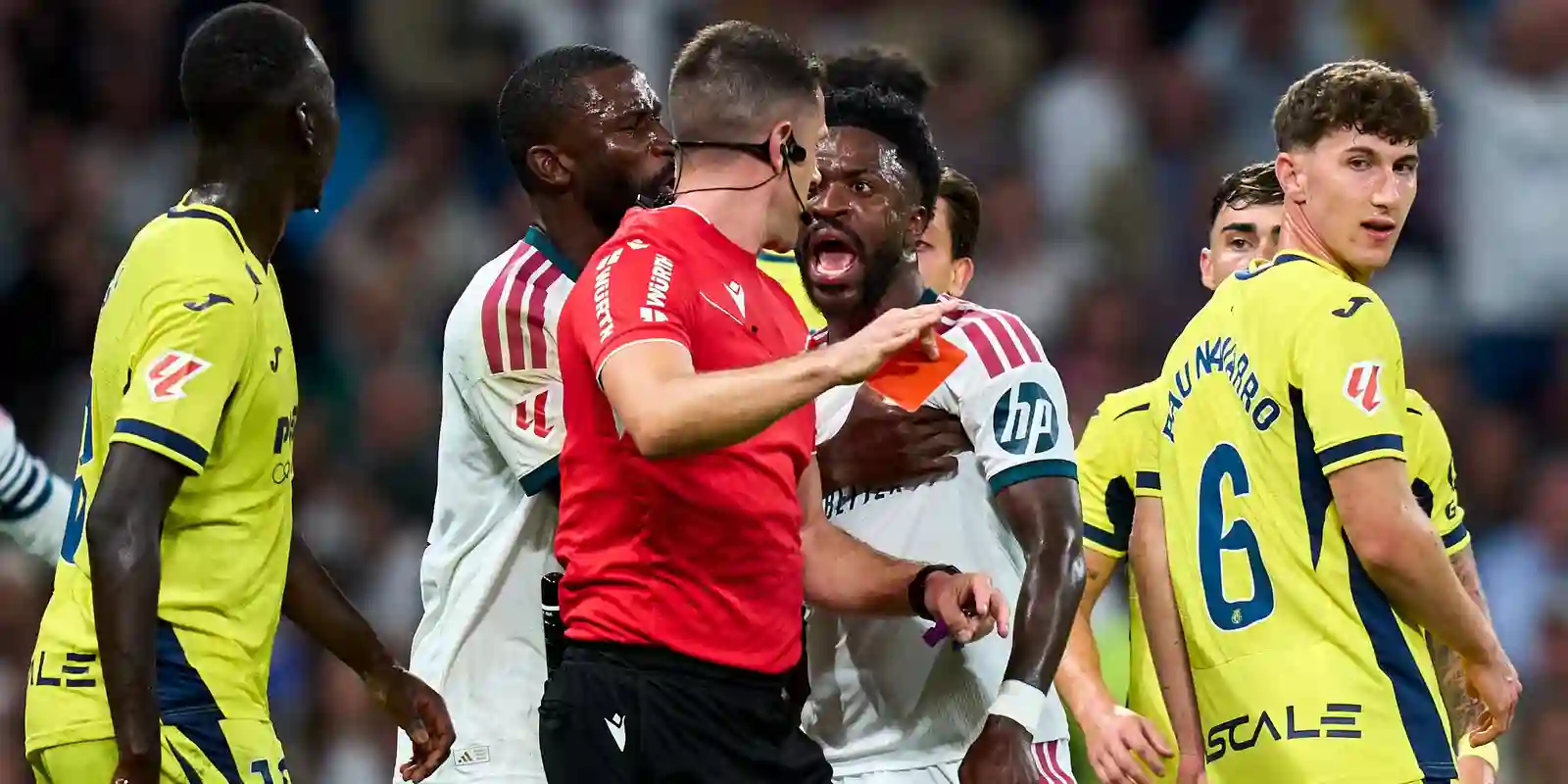 Vinicius Junior screming at the referee after being shown red card