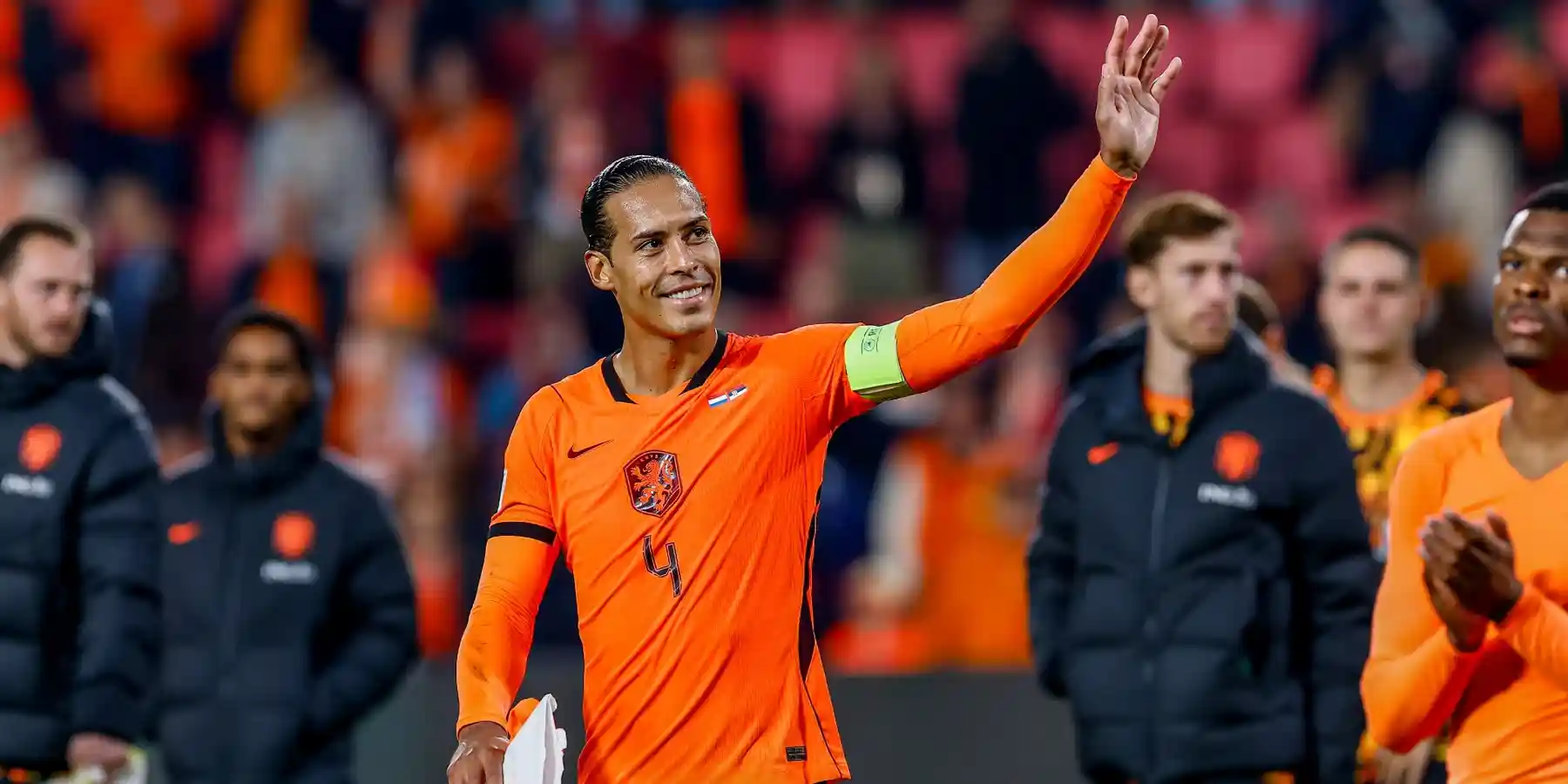 Virgil Van Dijk greets the crowd in his 100th appearance for the Netherlands